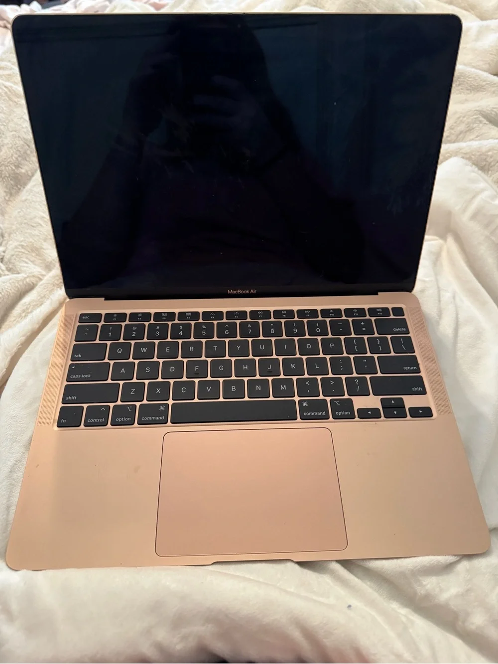 Apple Rose Gold MacBook M2179 does not turn on. For parts or repair only.